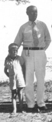 Ellis, Jr. with his grandfather, Frank Winstead.