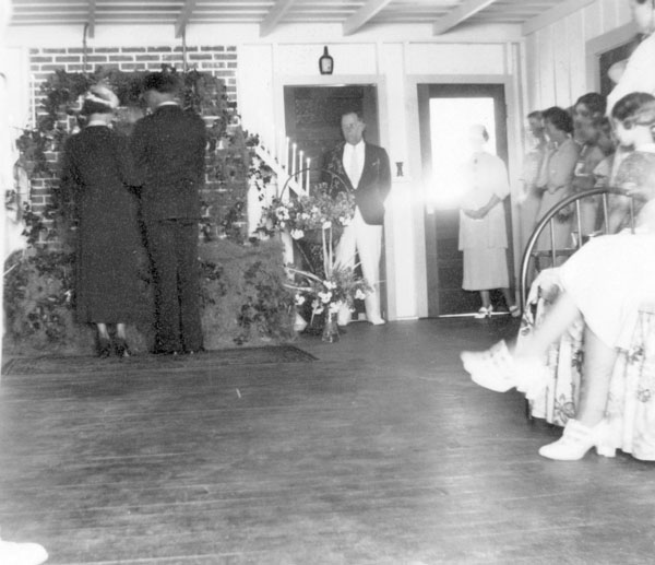 Mildred and Robert saying their vows.
