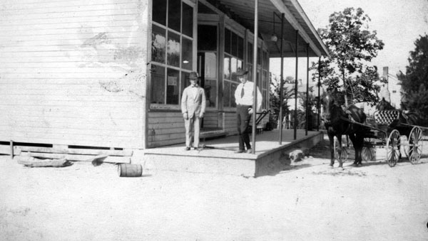 Frank and Burt Winstead in front of their general store.